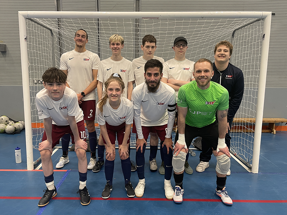 RNC's partially sighted team stand in goal in two rows